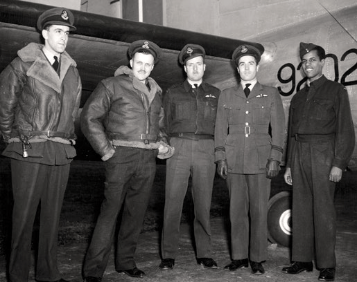 photo of the crew of the RCAF Fortress 9202 standing next to the airplane